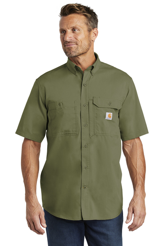 A man in a moss green polo